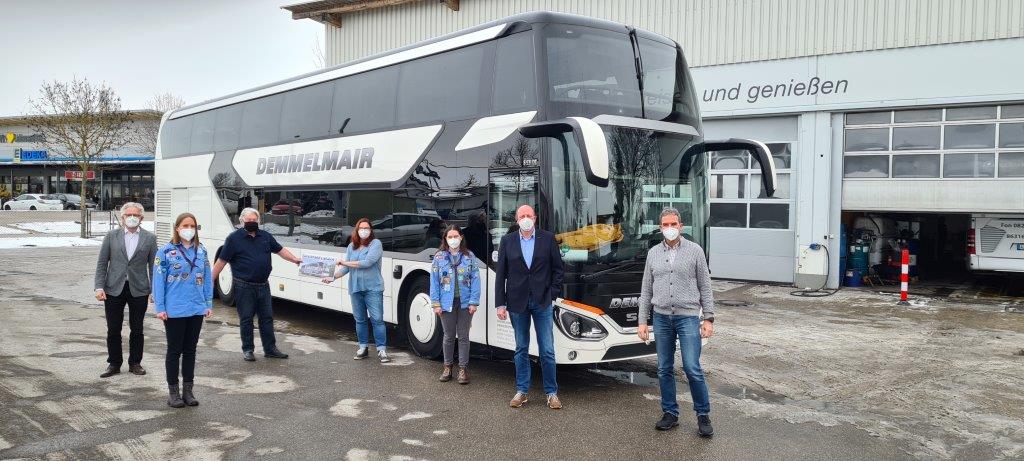 Coronakonforme Übergabe des Busgutscheins